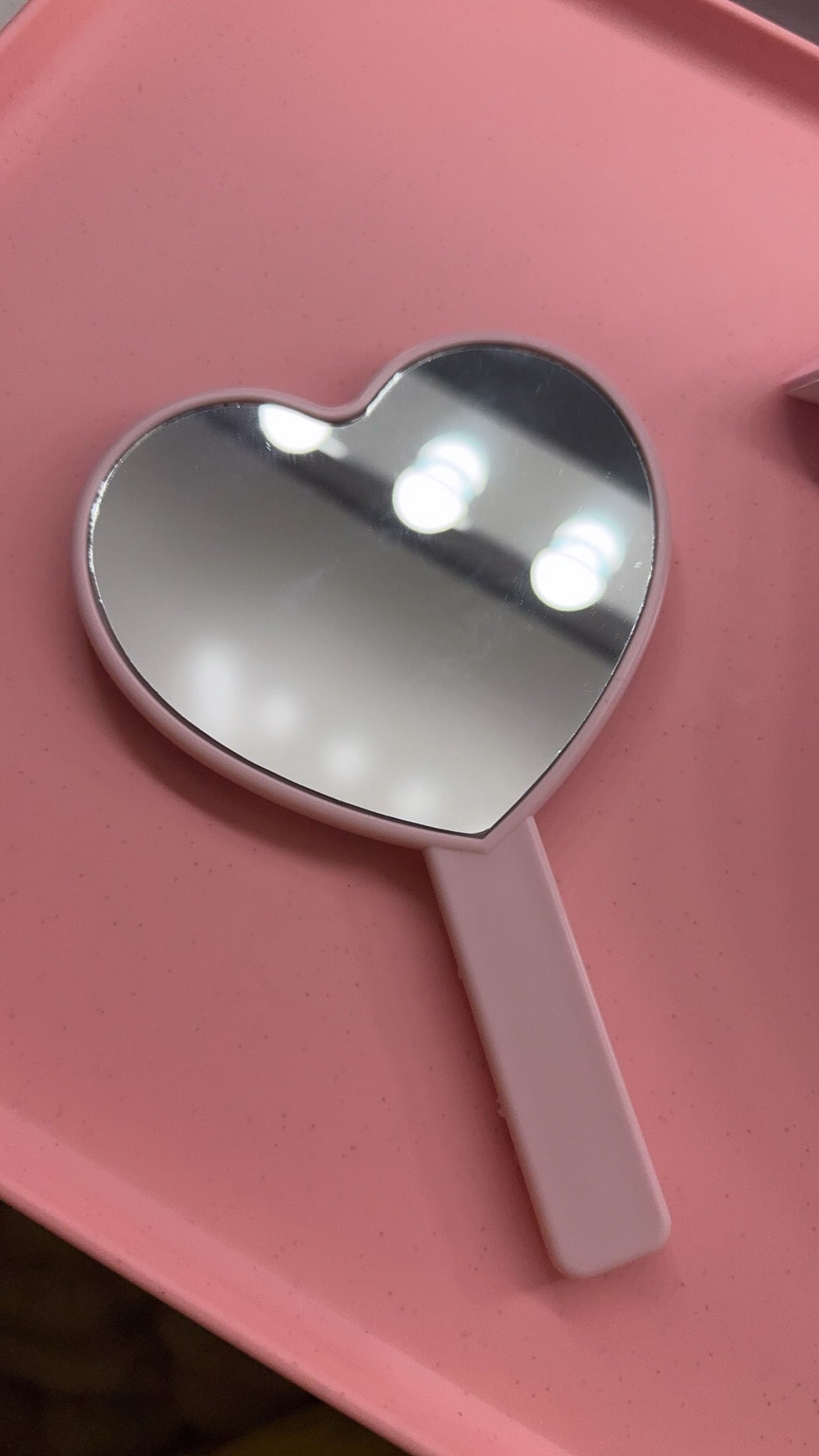 Pink junk mirror