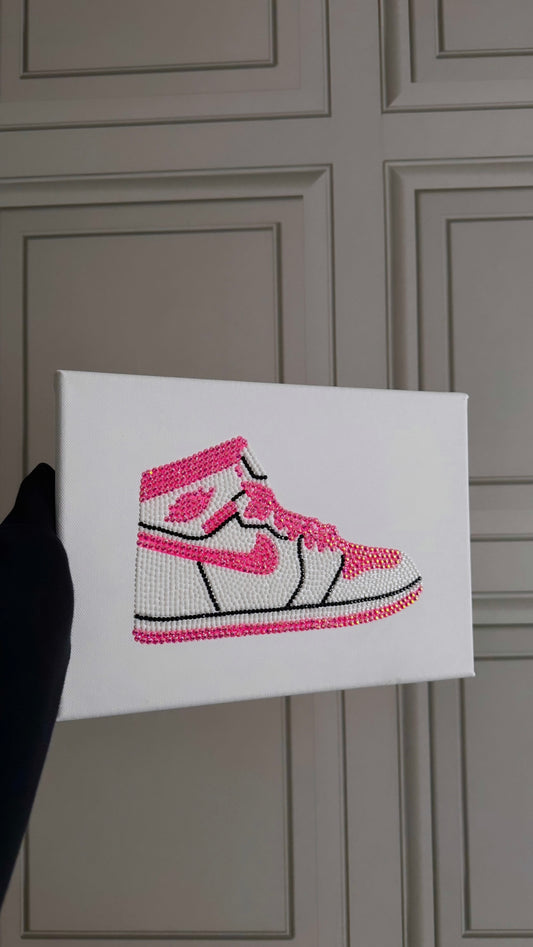 Pink and white Jordan trainer