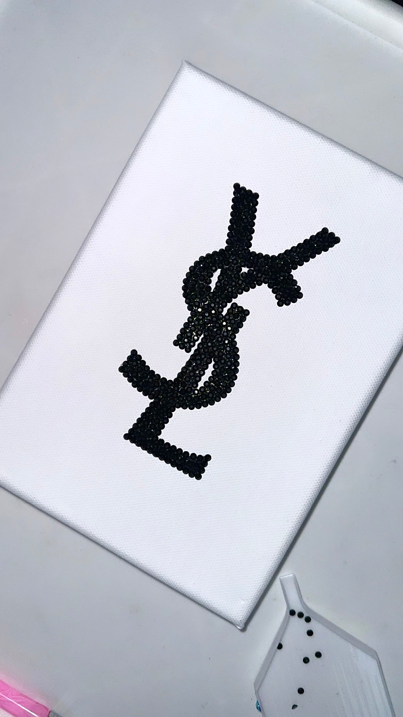 Black YSL logo