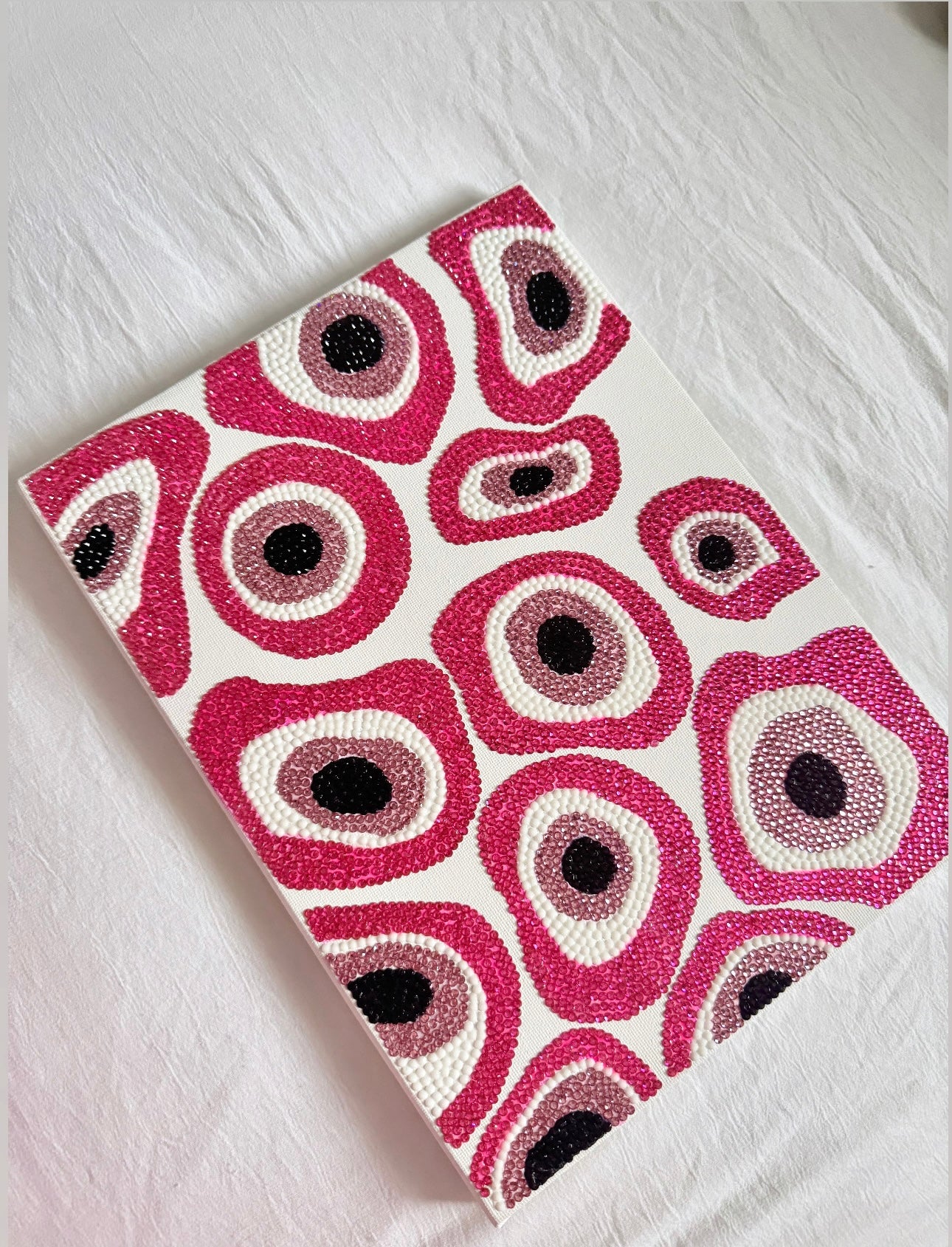 Pink evil eye gem canvas