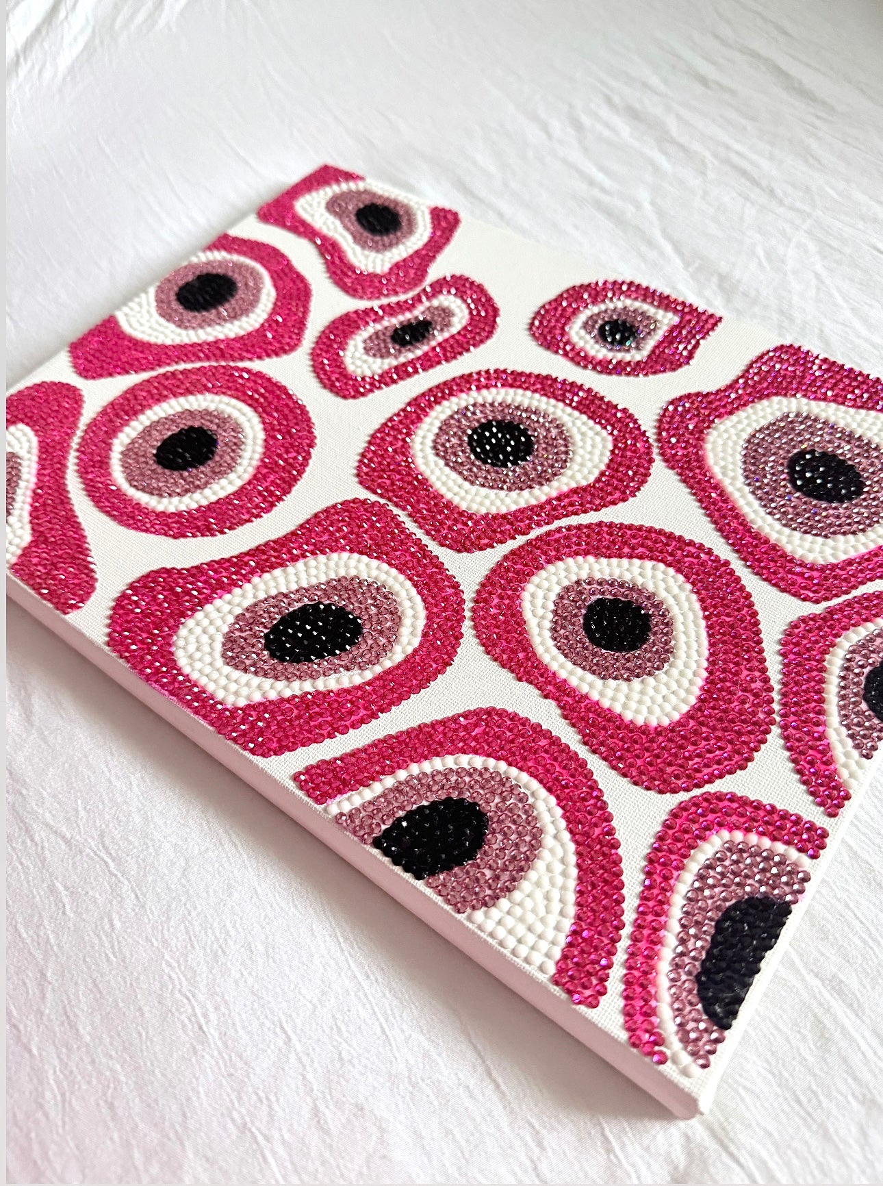 Pink evil eye gem canvas