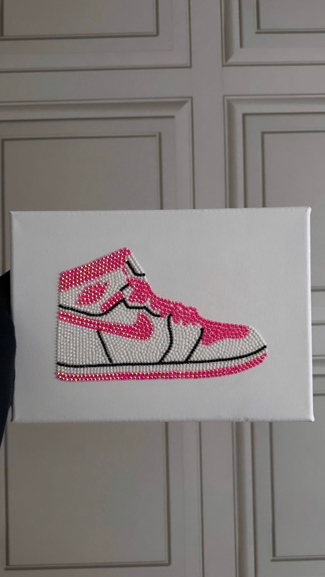 Pink and white Jordan trainer